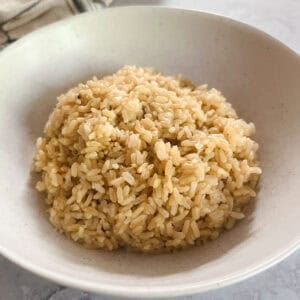 close up of a bowl of cooked brown rice