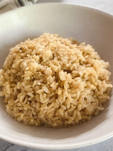 close up of a bowl of cooked brown rice