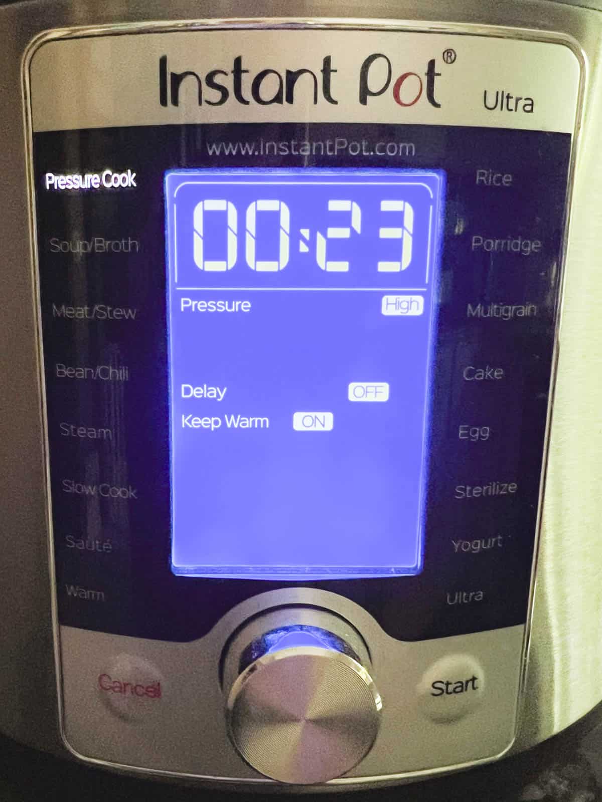 display panel of Instant Pot set to Pressure Cook at High pressure for 23 minutes