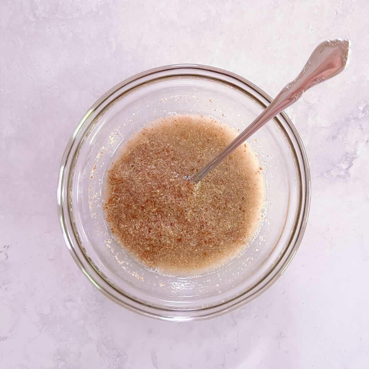 flax egg in a bowl with a spoon