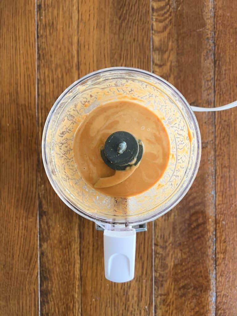 blended tangy peanut dressing in a food processor