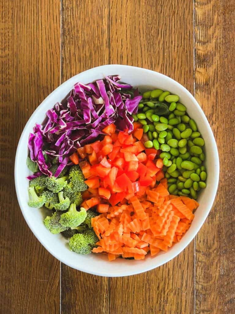 overhead of veggies arranged in a bowl