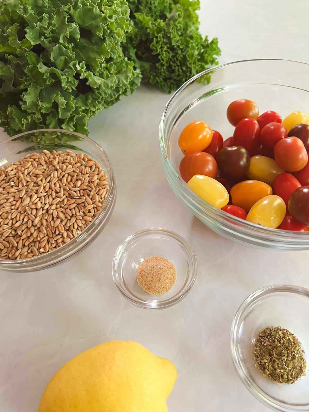 ingredients for farro and kale salad with blistered tomatoes