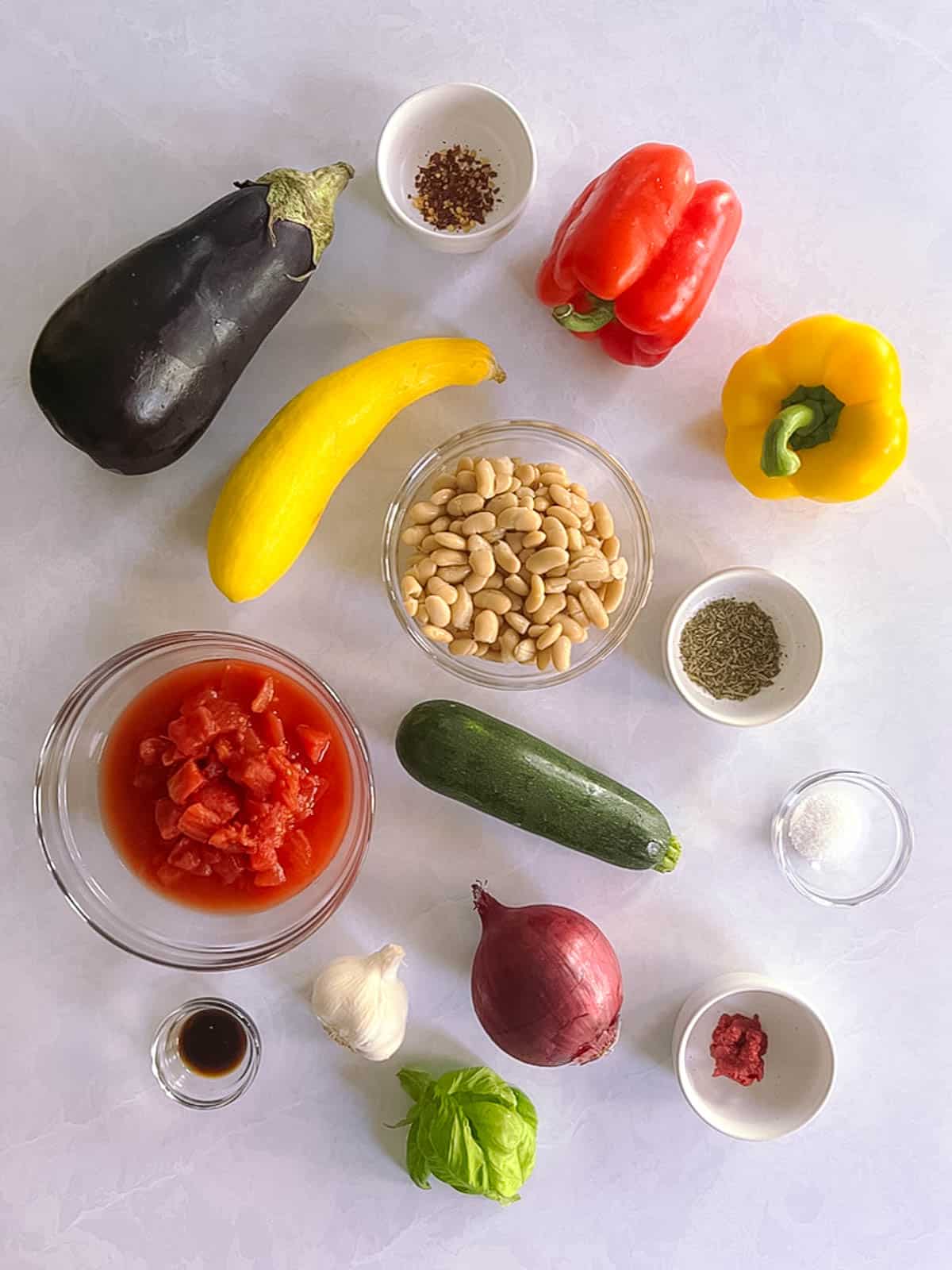 overhead view of ingredients for slow cooker ratatouille with white beans