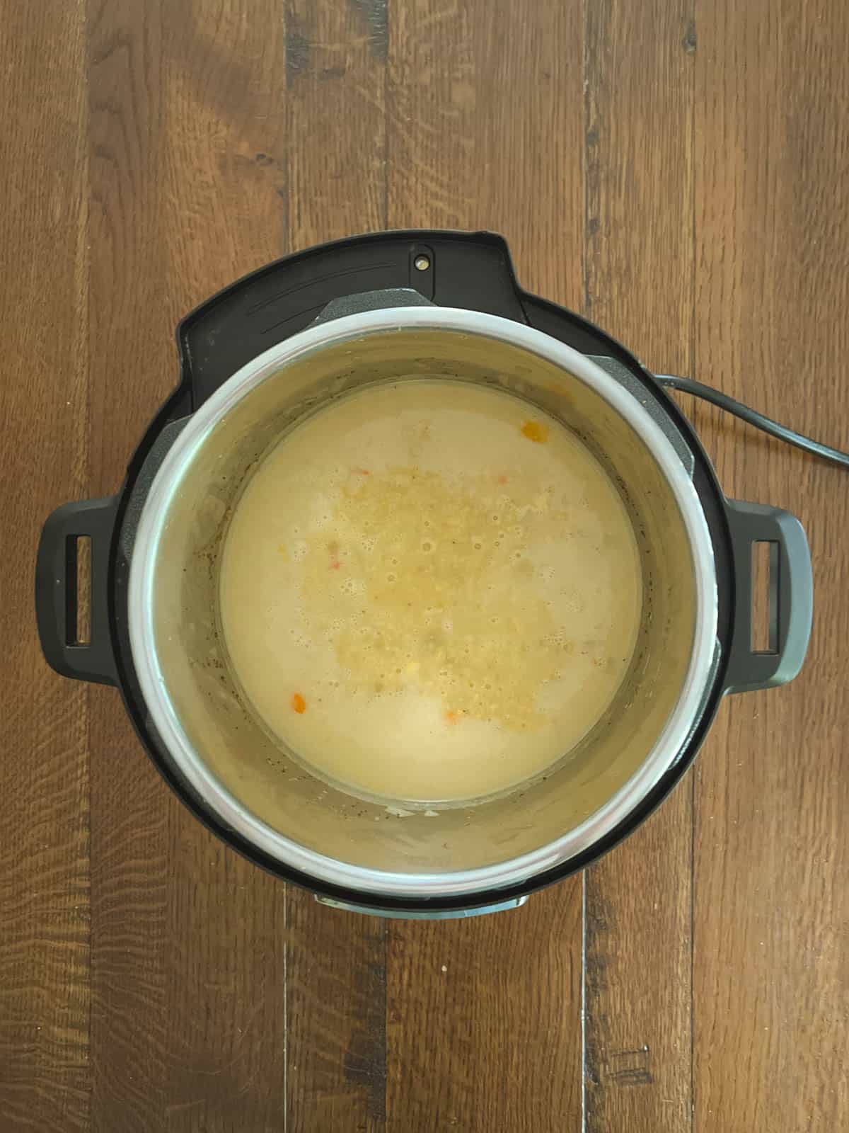 Instant Pot with blended corn chowder added back in