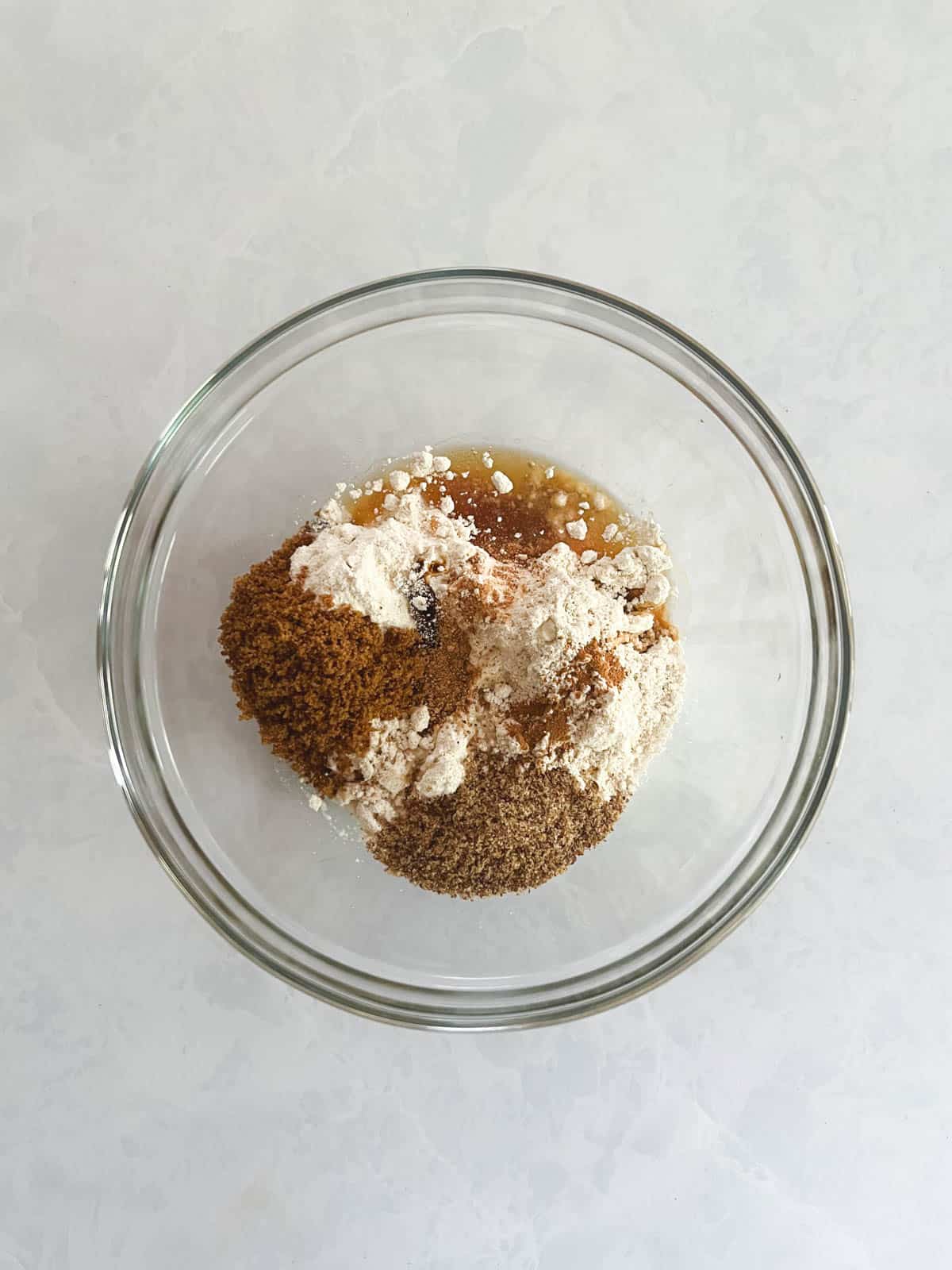 bowl of unmixed ingredients for graham cookie crumble