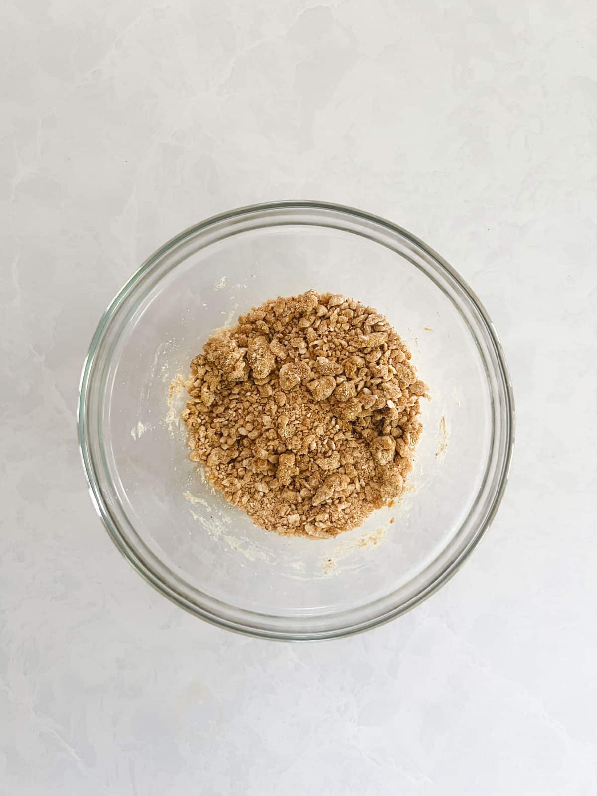 bowl of mixed ingredients for graham cookie crumble