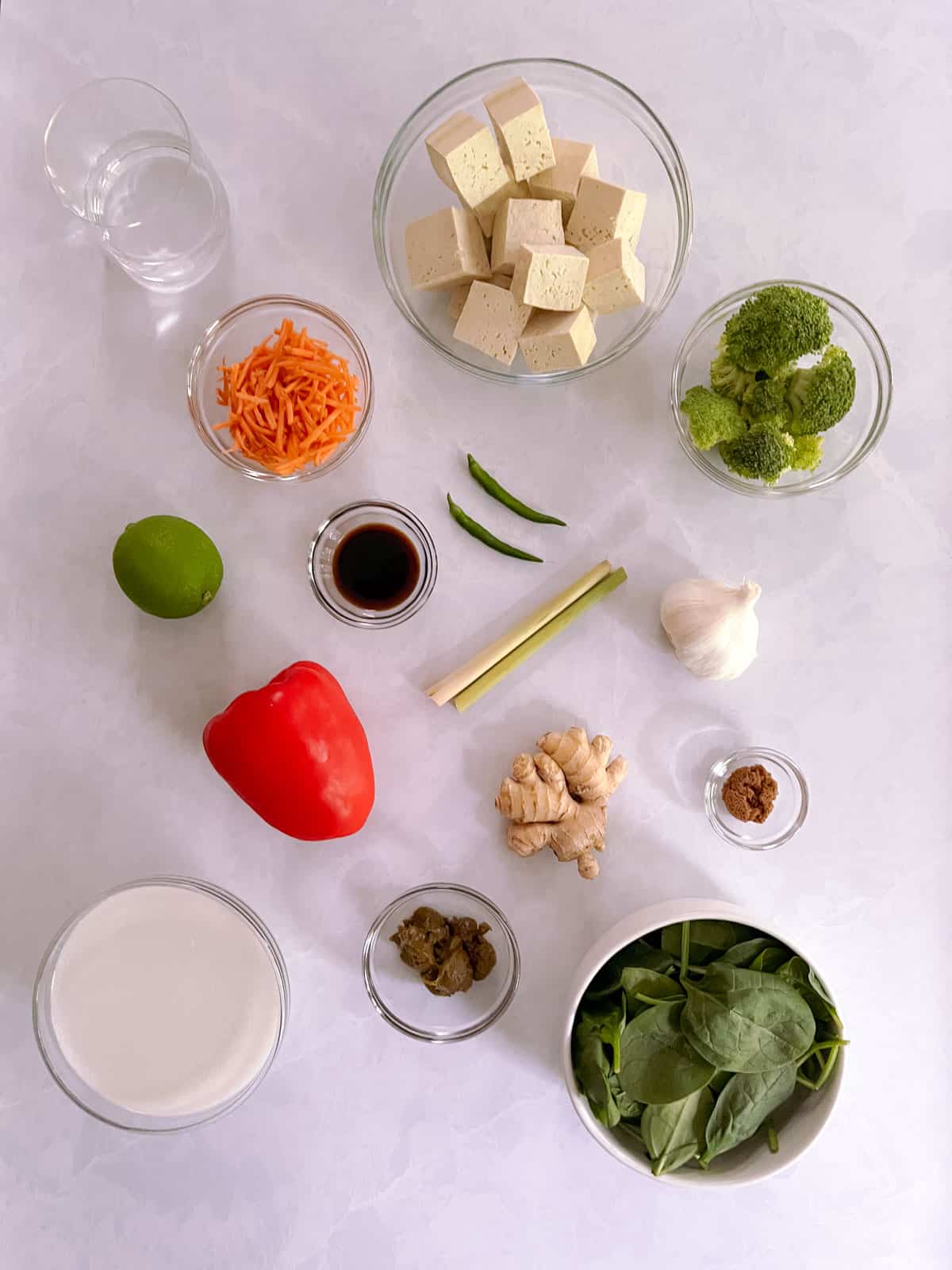 ingredients for easy vegan green curry with tofu and vegetables