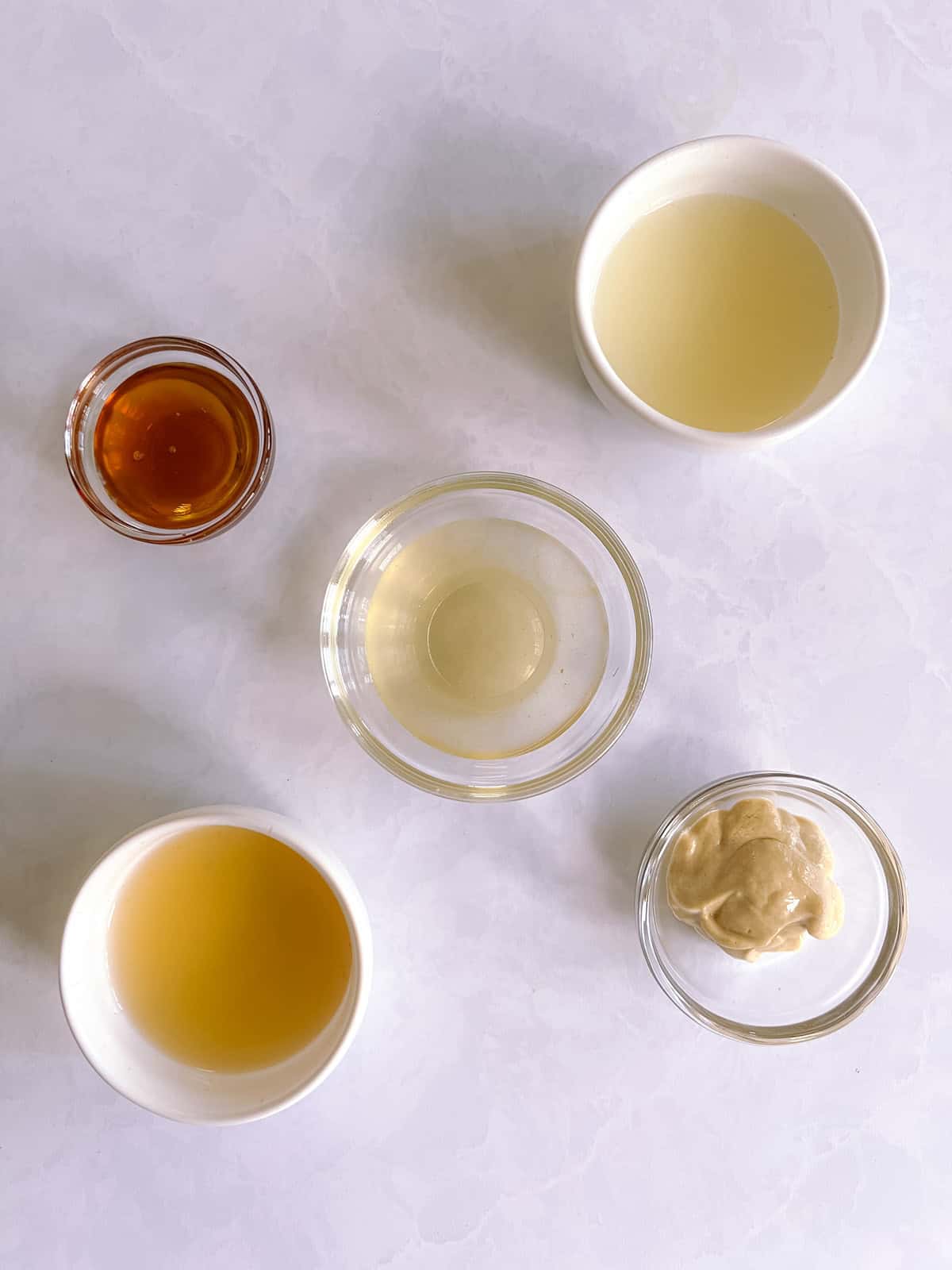 overhead view of ingredients for apple cider vinaigrette