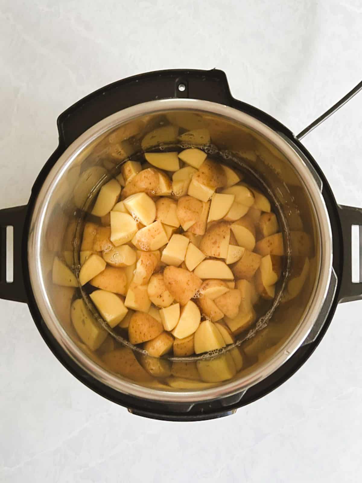 chopped potatoes and water in an instant pot