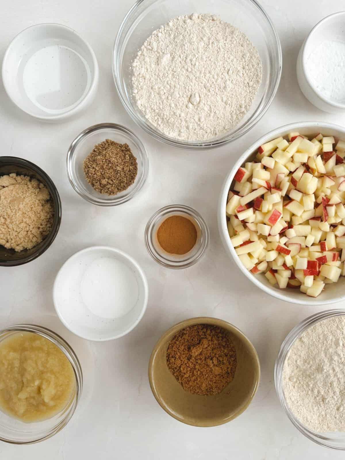 overhead view of bowls containing ingredients for apple coffee cake