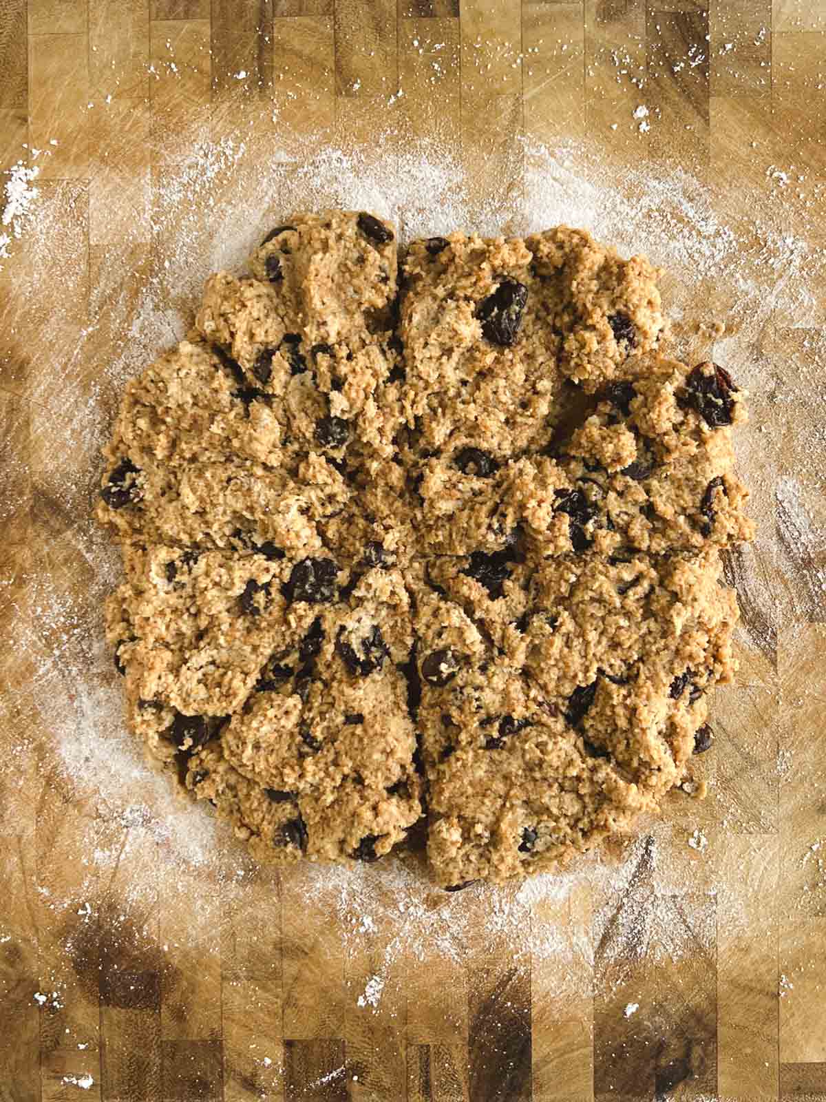 dough in a circle on a cutting board