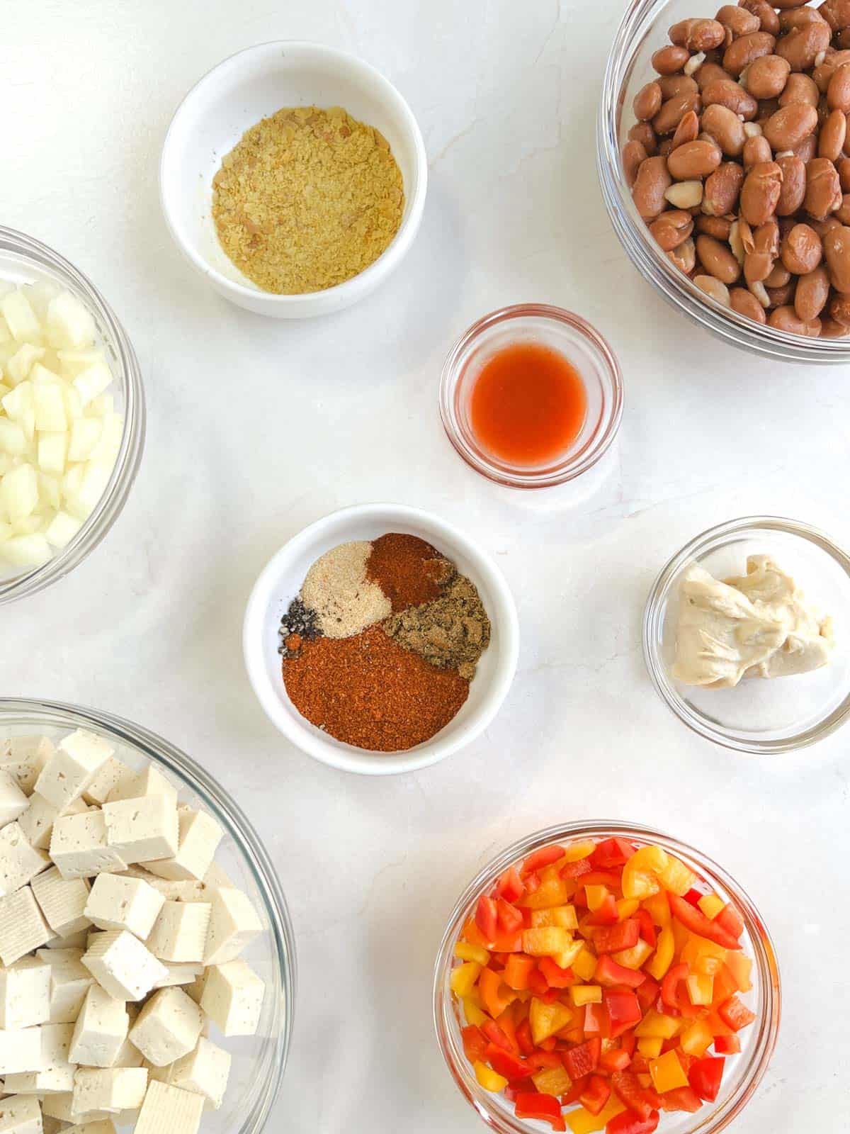 bowls containing ingredients for Tex-Mex skillet supper