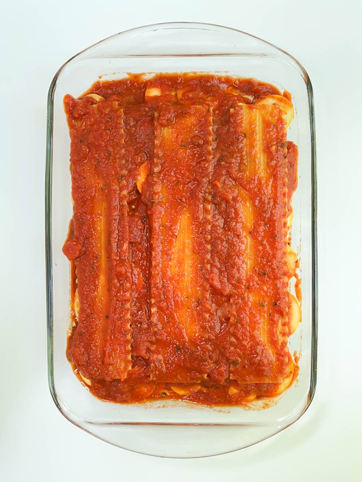 Vegan zucchini lasagna in a glass casserole dish