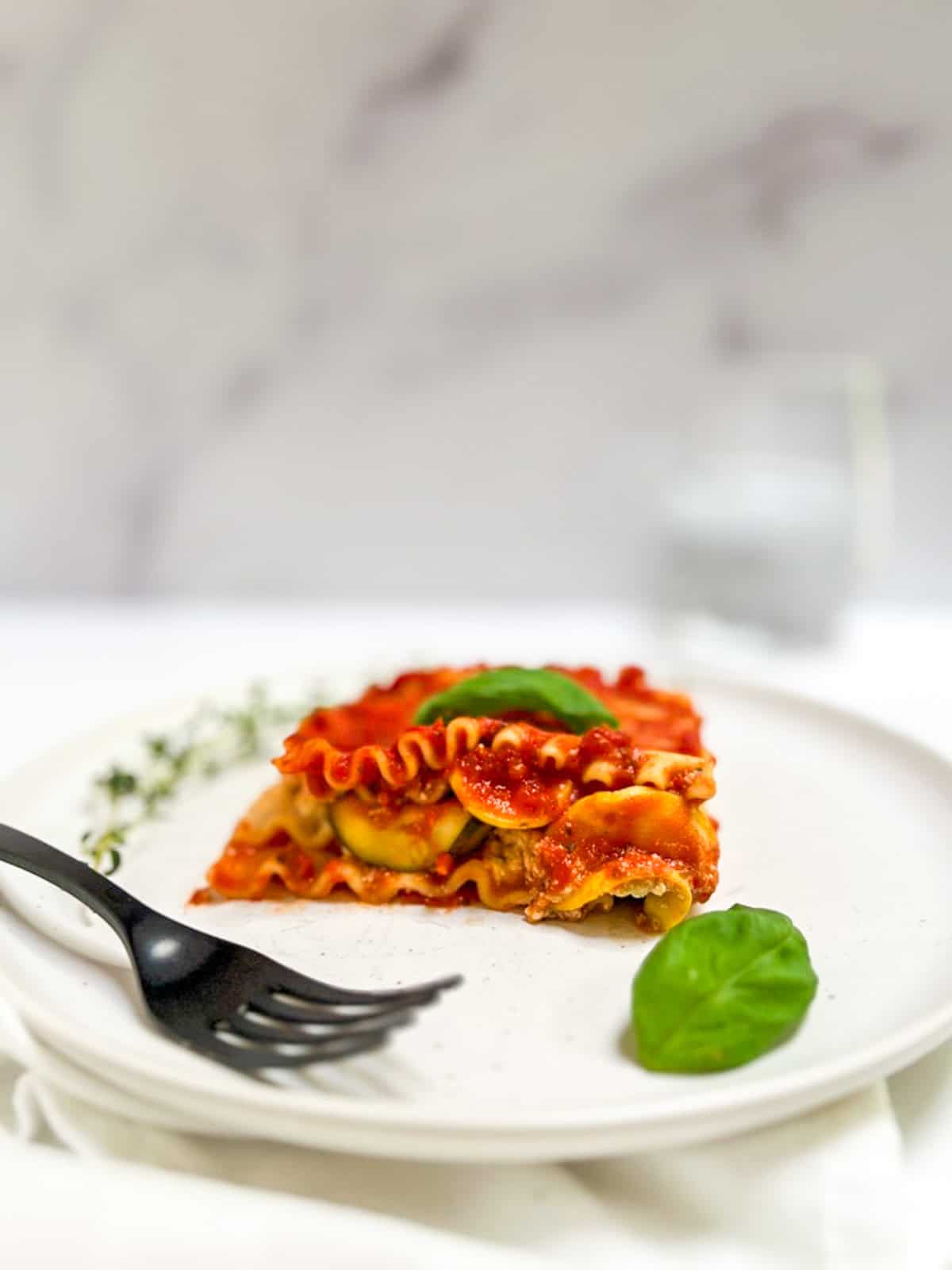 Vegan lasagna with zucchini and basil