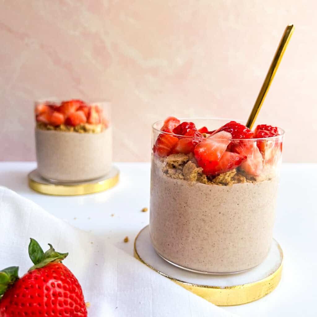 Strawberry overnight oats in a glass.