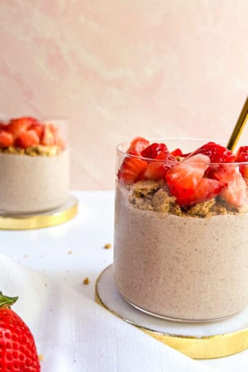 Strawberry overnight oats in a glass.