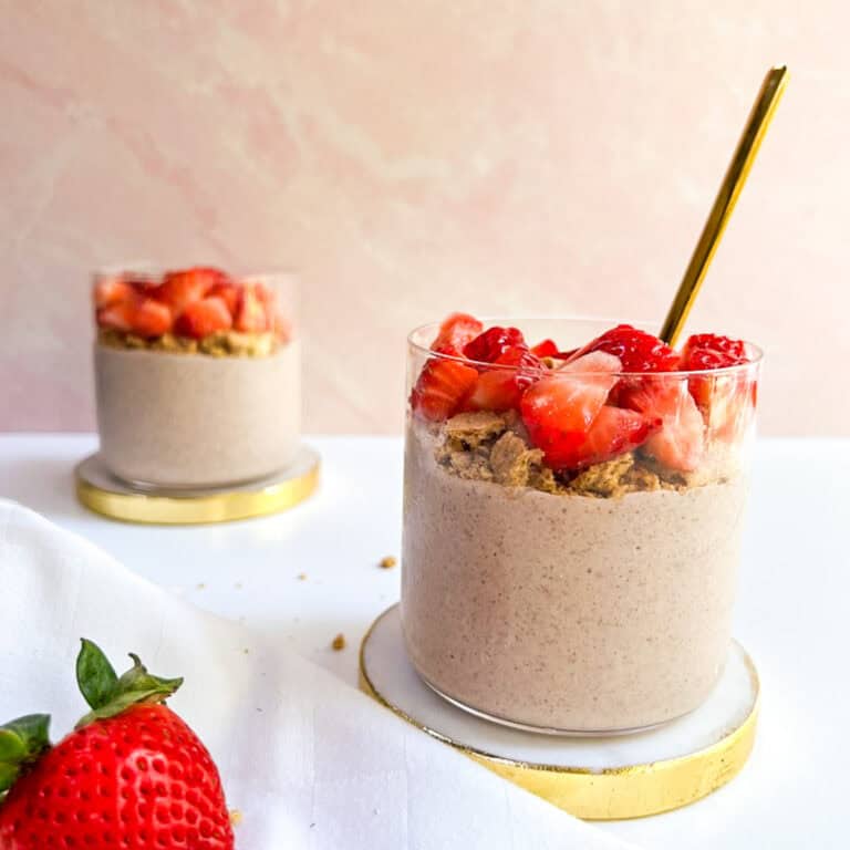 Strawberry overnight oats in a glass.