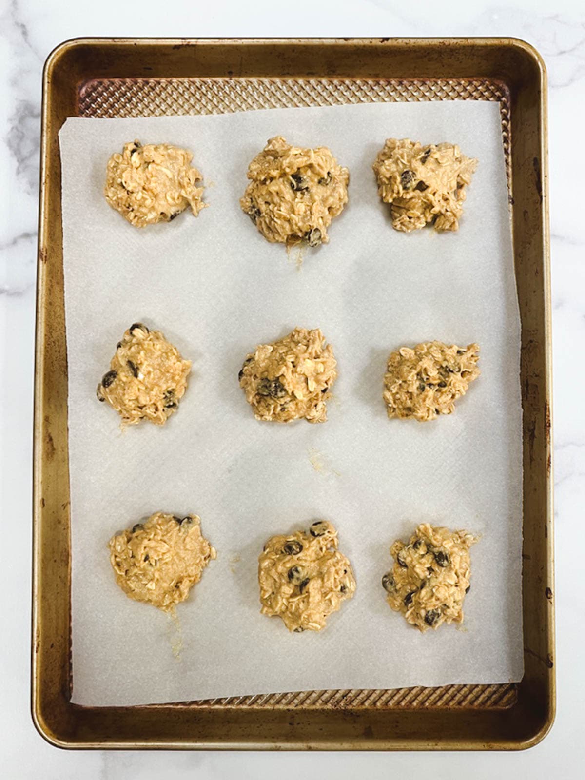 A baking sheet with breakfast cookies on it.